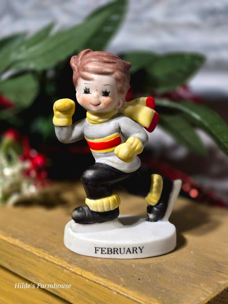 Vintage "February" Boy Figurine